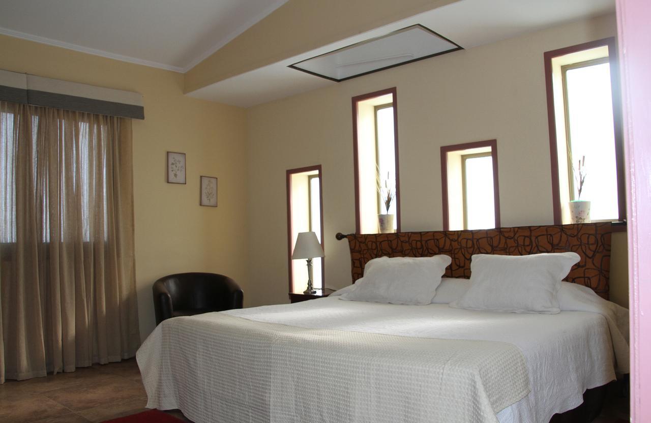 Atakama Kull Hotel Calama Bagian luar foto