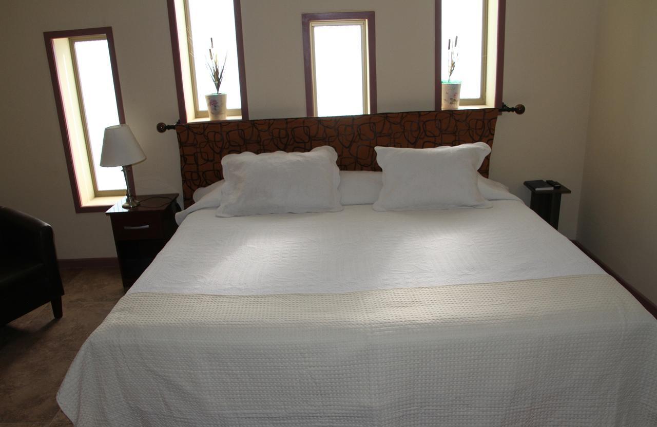 Atakama Kull Hotel Calama Bagian luar foto